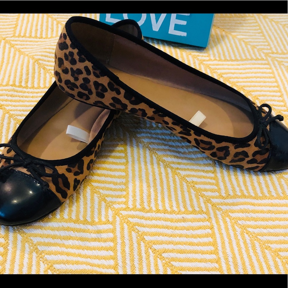 Leopard print slip on shoe. GUC. Black patent toe.